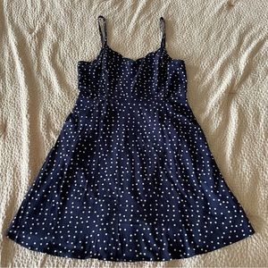 Adorable polka dot dress with scalloped details